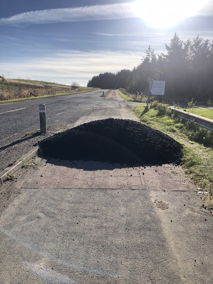 Heads up <a href="/EastAyrshire/">East Ayrshire</a> there is a massive pile of discarded tarmac blocking the whole bike lane on the A77. No signs so assume it to be dumped. Someone has already hit it 😯