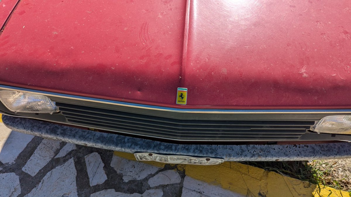 codepo8's tweet photo. I am far from being a car expert, and the colour is red, but I have certain doubts about the authenticity of this Ferrari. https://t.co/TLgxHE0PzA
