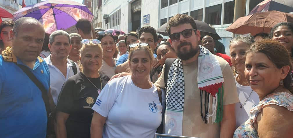 CubaMined's tweet photo. #CubaMined presente en la marcha en apoyo al pueblo de Palestina https://t.co/YmmpD6X6lY