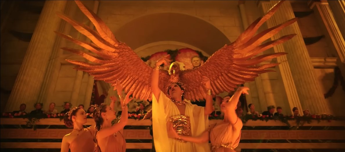 mrsloppytom's tweet photo. say what you will about megalopolis, no one can deny the incredible set design. just look at this shot with its beautiful roman columns, patterned balcony, plus the giant hawk too! https://t.co/5QfzcZ1tsU