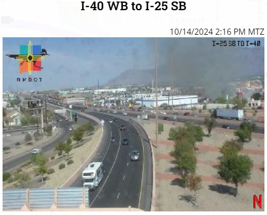 TessaMentus's tweet photo. #BREAKING: hotel on fire near Big I.  Menaul closed in both directions. Lots of @abqfire units heading to this one, along with our @Monica_Logrono. @KOB4 https://t.co/2n2gMgueCF