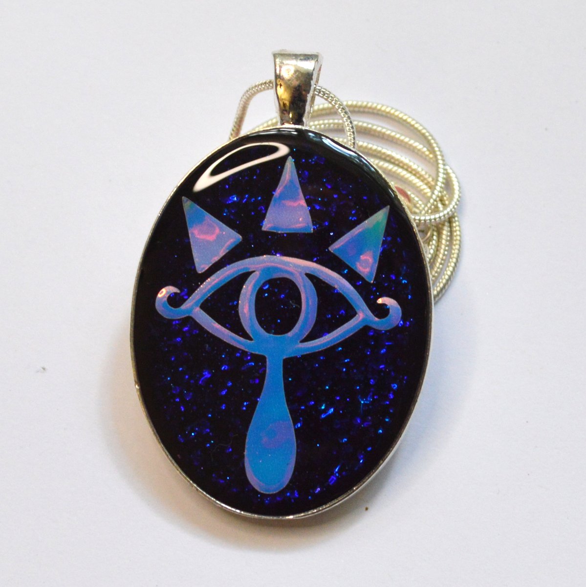 femmecraft's tweet photo. This #Zelda themed design is back! Featuring a new shinier holographic background and sleeker variation, these are sure to appeal to fellow wanderers of Hyrule. https://t.co/B0rg6knSzC