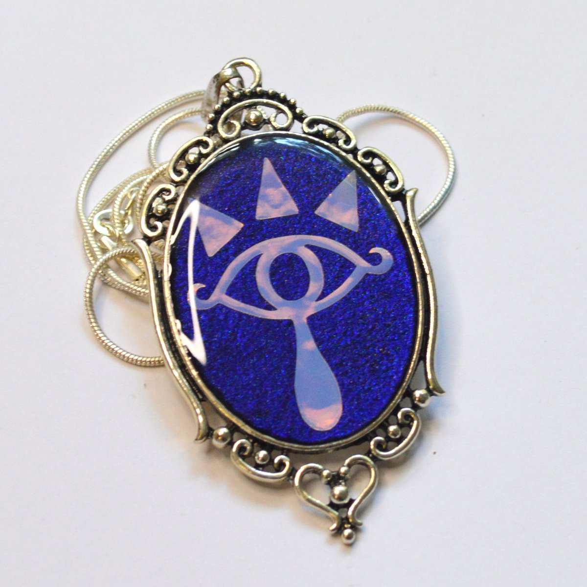femmecraft's tweet photo. This #Zelda themed design is back! Featuring a new shinier holographic background and sleeker variation, these are sure to appeal to fellow wanderers of Hyrule. https://t.co/B0rg6knSzC