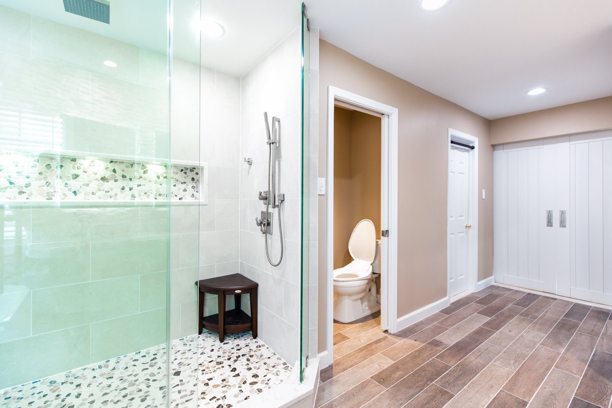 kbskitchenbath's tweet photo. Unwind in this stunning spa-like bathroom! 🌿 The sleek glass shower &amp; custom pebble tile offer style &amp; serenity. Ready to create your own oasis? Let's chat! 🛁 #BathroomRemodel #HomeDesign https://t.co/sXjX4wq87E
