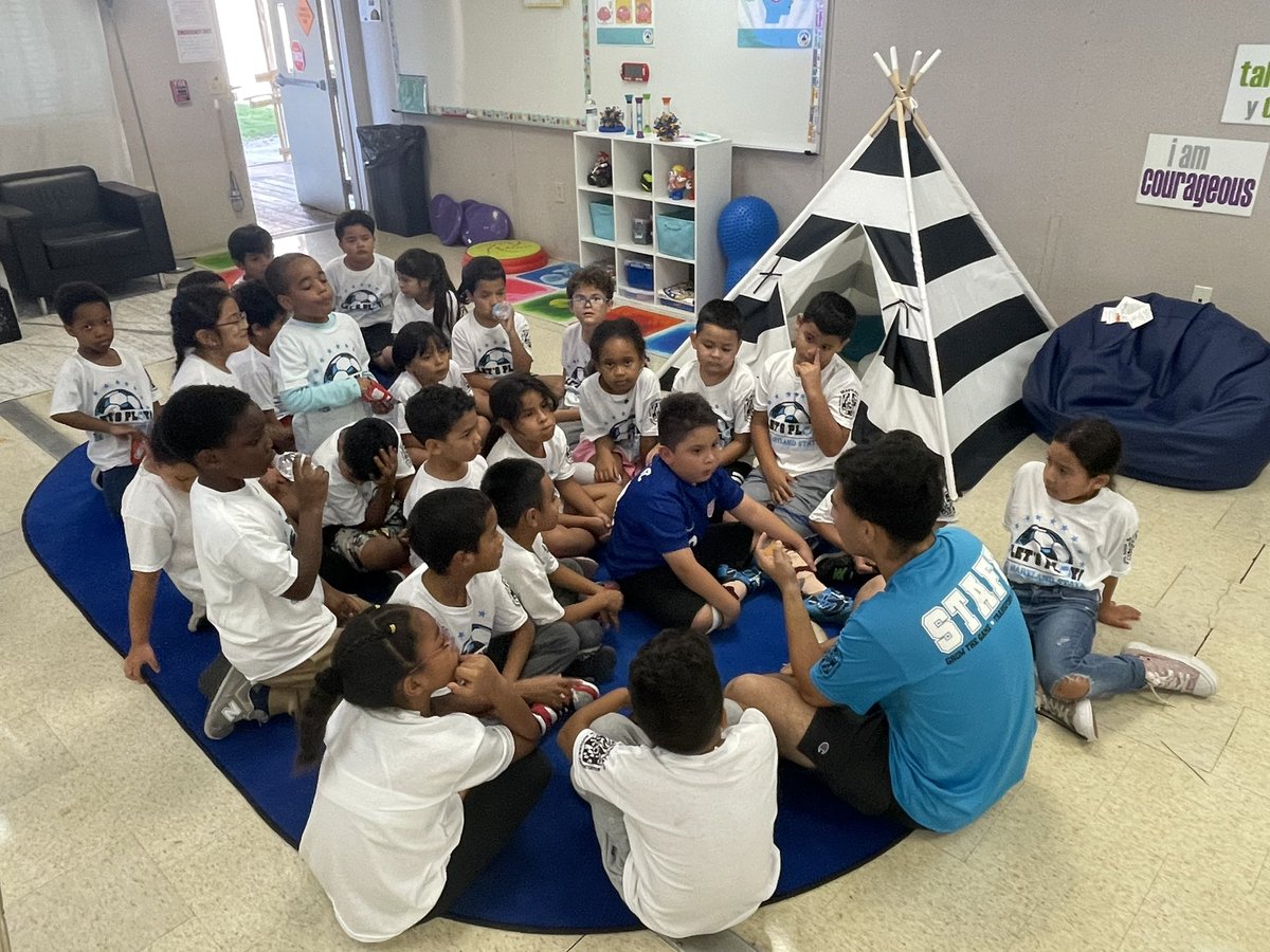GaithersburgWT's tweet photo. Tying in mindfulness with Let’s Play Soccer on a rainy day. Big shout out to @LPFsports for the cleats. Girls On The Run overcome challenges through game.@CSconnect_MCPS https://t.co/q8SUYgbnJK