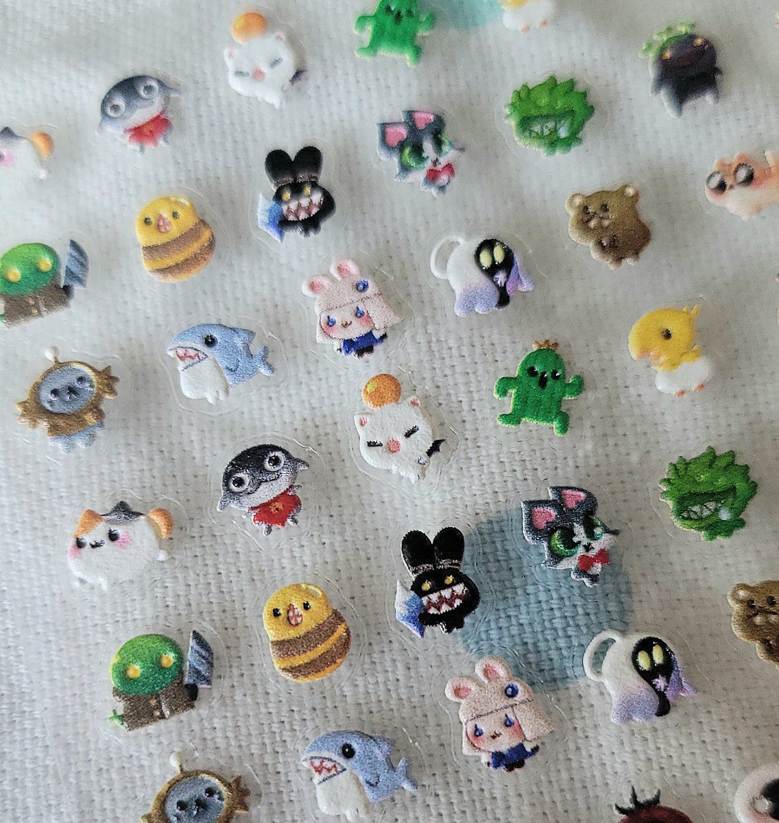CofyBiscuit's tweet photo. made some itty bitty ffxiv nail stickers for an upcoming con 🥹 as the name suggests they're for nail art but def can be used for other things like tiny deco!! i love the texture of them ^o^ maybe ill sell leftovers online! https://t.co/ftFrfsB5cS