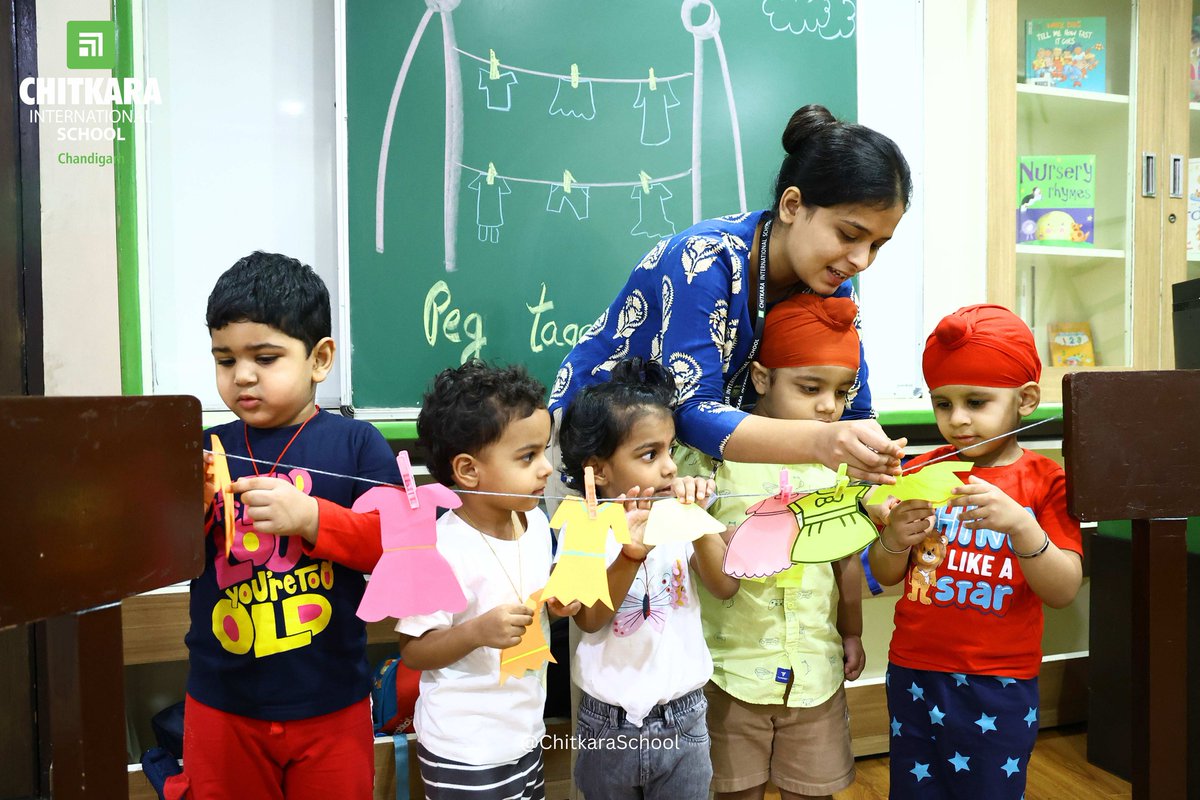 chitkara_school's tweet photo. Winsome Chitkarians of Chitkara International Schoolโs Chicklets Unleash Creativity and Coordination Through the Engaging โPeg Taggingโ Activity
#CIS #chicklets #kids #kindergarten #activity #ChitkaraInternationalSchool #pegtagging #labellingclothes https://t.co/gt5lRfzCXZ