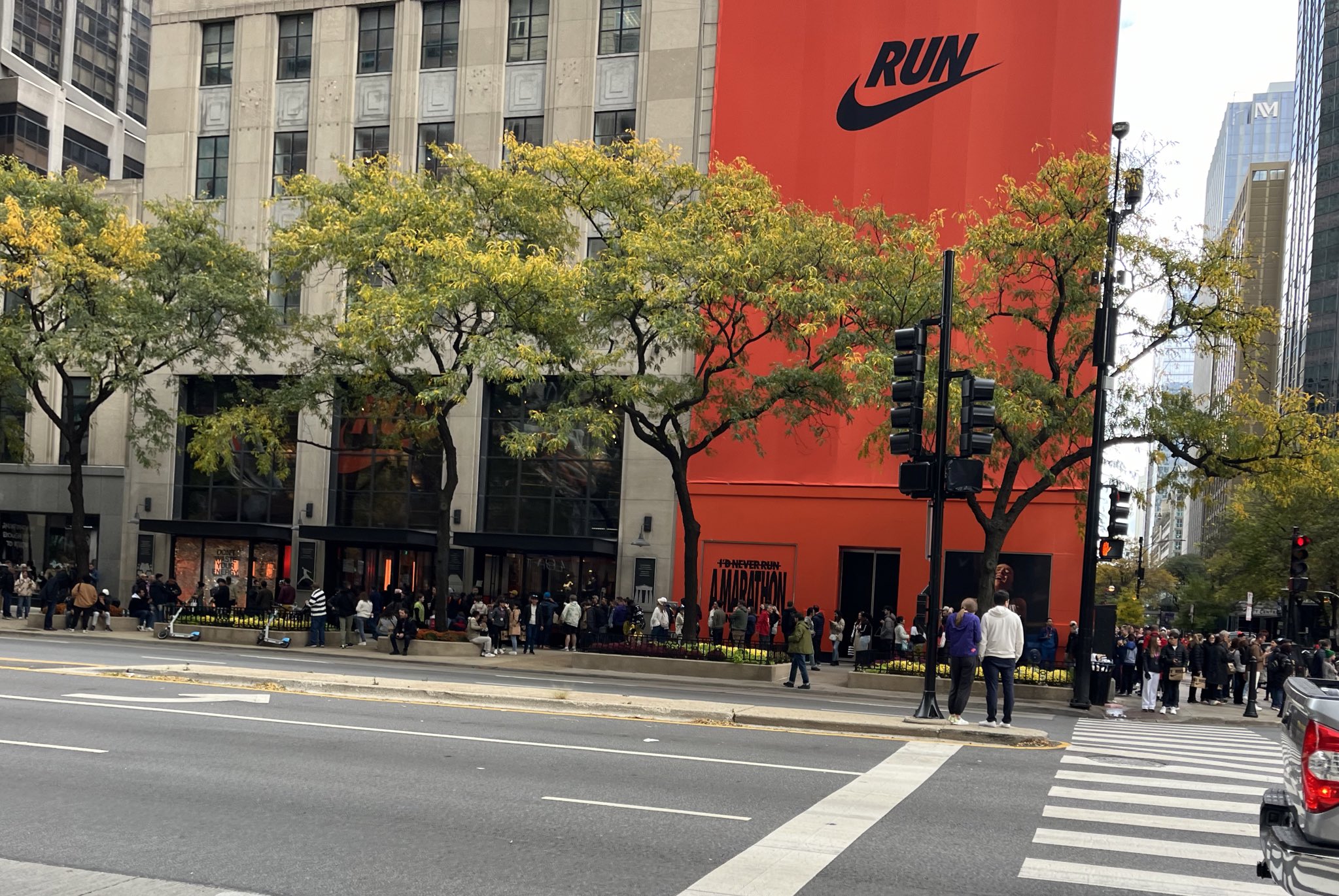Nachoblivion on X Line around the block at the Nike store today. I m guessing there was some sort of special sale for those who ran in the Chicago marathon yesterday. Half