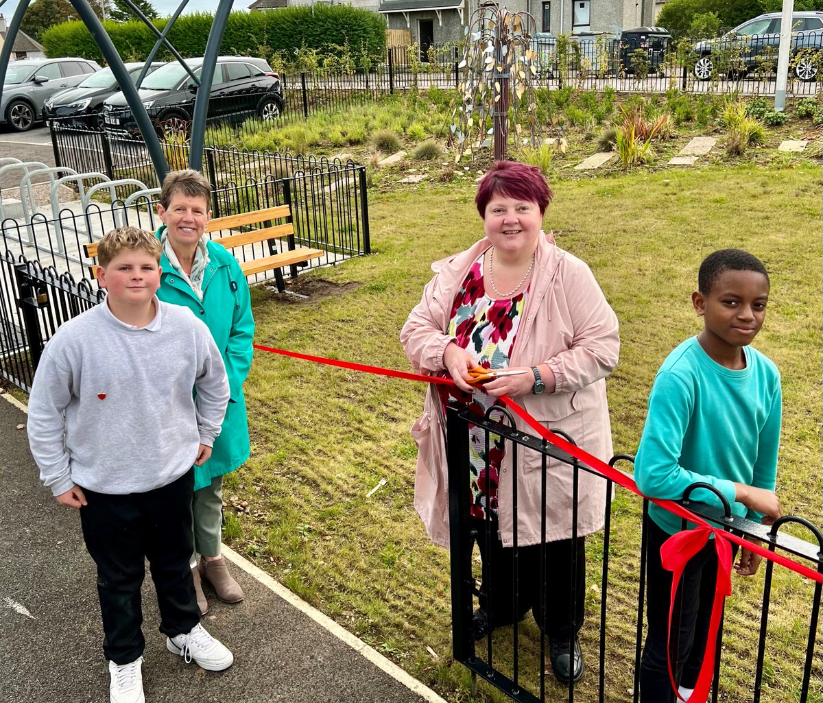 Aberdeen City Council (@aberdeencc) on Twitter photo A commemorative bench for June McCombie, a former lollipop lady, has been unveiled in the new Greyhope Community Garden, Torry.
orlo.uk/umGzU
Greyhope School captains Leo (L) and Precious (R) with Anne, June's sister; and Paula, June's daughter.
<a href="/morrisonbuilds/">Morrison Construction</a> A commemorative bench for June McCombie, a former lollipop lady, has been unveiled in the new Greyhope Community Garden, Torry.
orlo.uk/umGzU
Greyhope School captains Leo (L) and Precious (R) with Anne, June's sister; and Paula, June's daughter.
<a href="/morrisonbuilds/">Morrison Construction</a>