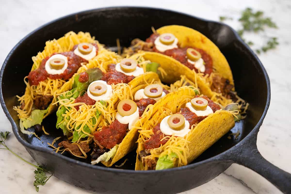 Spice up your Halloween with spooky tacos! Packed with bold flavors and festive toppings, these are perfect for a hauntingly delicious meal! bowl-me-over.com/halloween-taco…