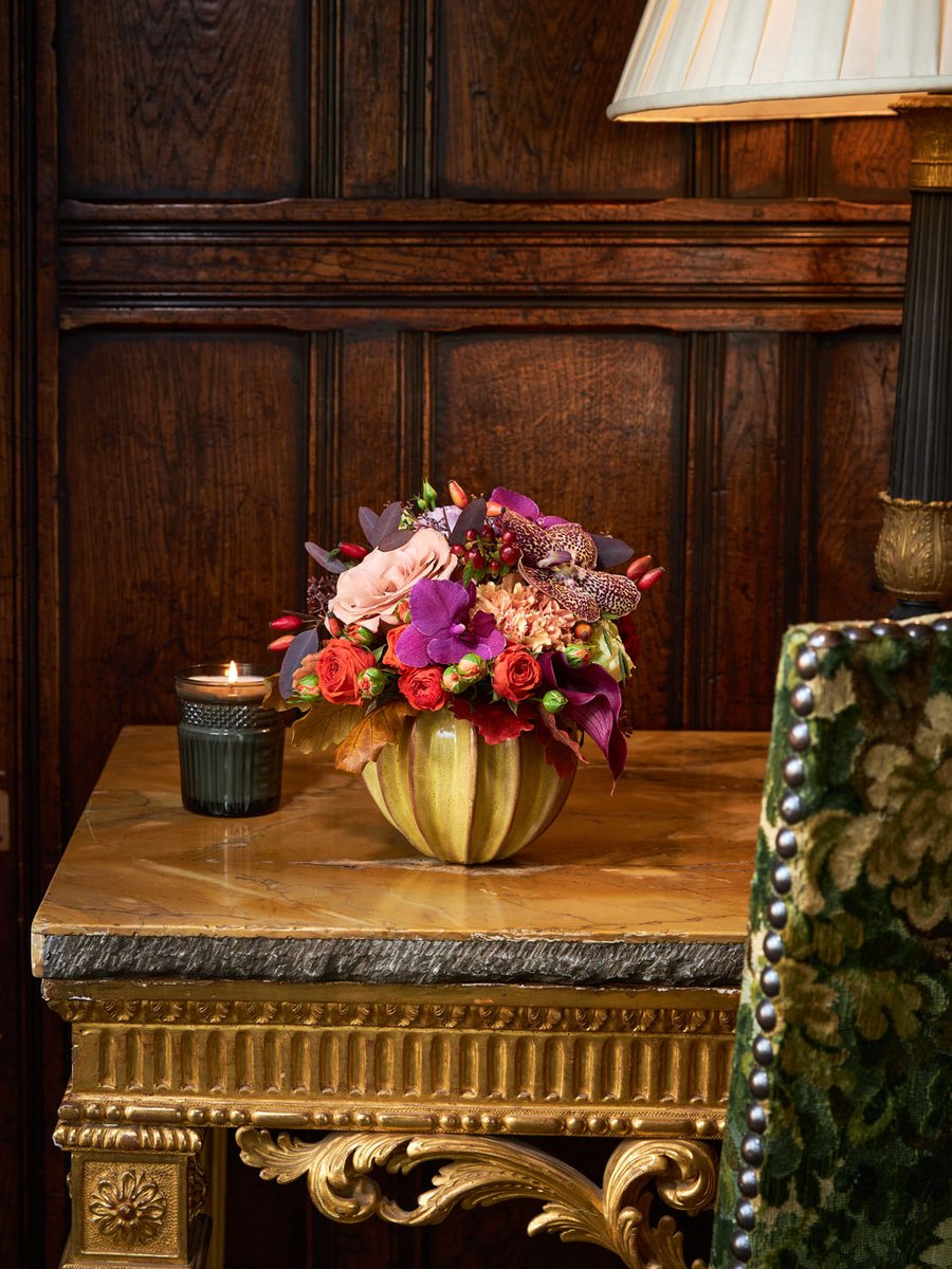 Give the gift of seasonal beauty with our Petite Couture design. Featuring rare autumnal blooms, berries, rose hips, and foliage, it's elegantly arranged in a pale ochre, mouth-blown glass vase, handcrafted to mirror the soft curves of a pumpkin.

#NeillStrainFloralCouture