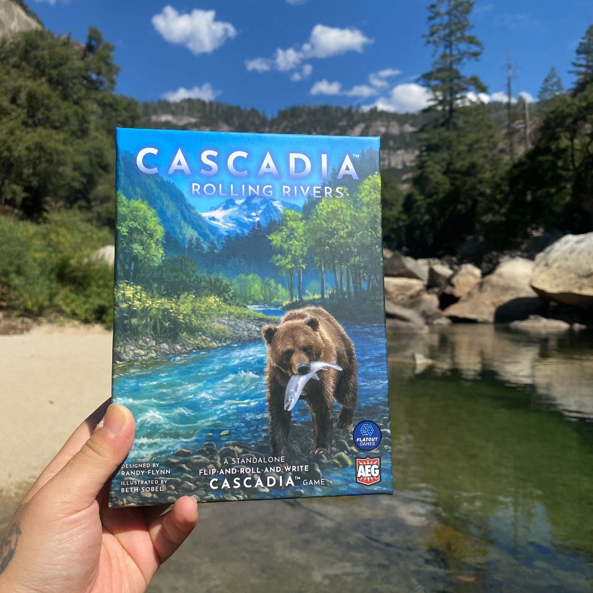 Cascadia Rolling is out now! 🌲 🌲 🌲 

The newest addition to the Cascadia universe is out in  the wild NOW! Get it today from the Alderac store to receive the Cascadia Rolling micro expansion for free! Otherwise, pick it up wherever you get games!