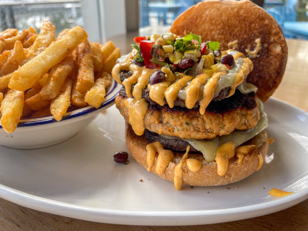 Burger of the Week 🍔: Smoked Salmon Burger topped with crispy fried onions, fresh arugula, and blackened remoulade sauce. Available 10/12 - 10/18 only! Don’t miss this mouthwatering flavor combo. 😋