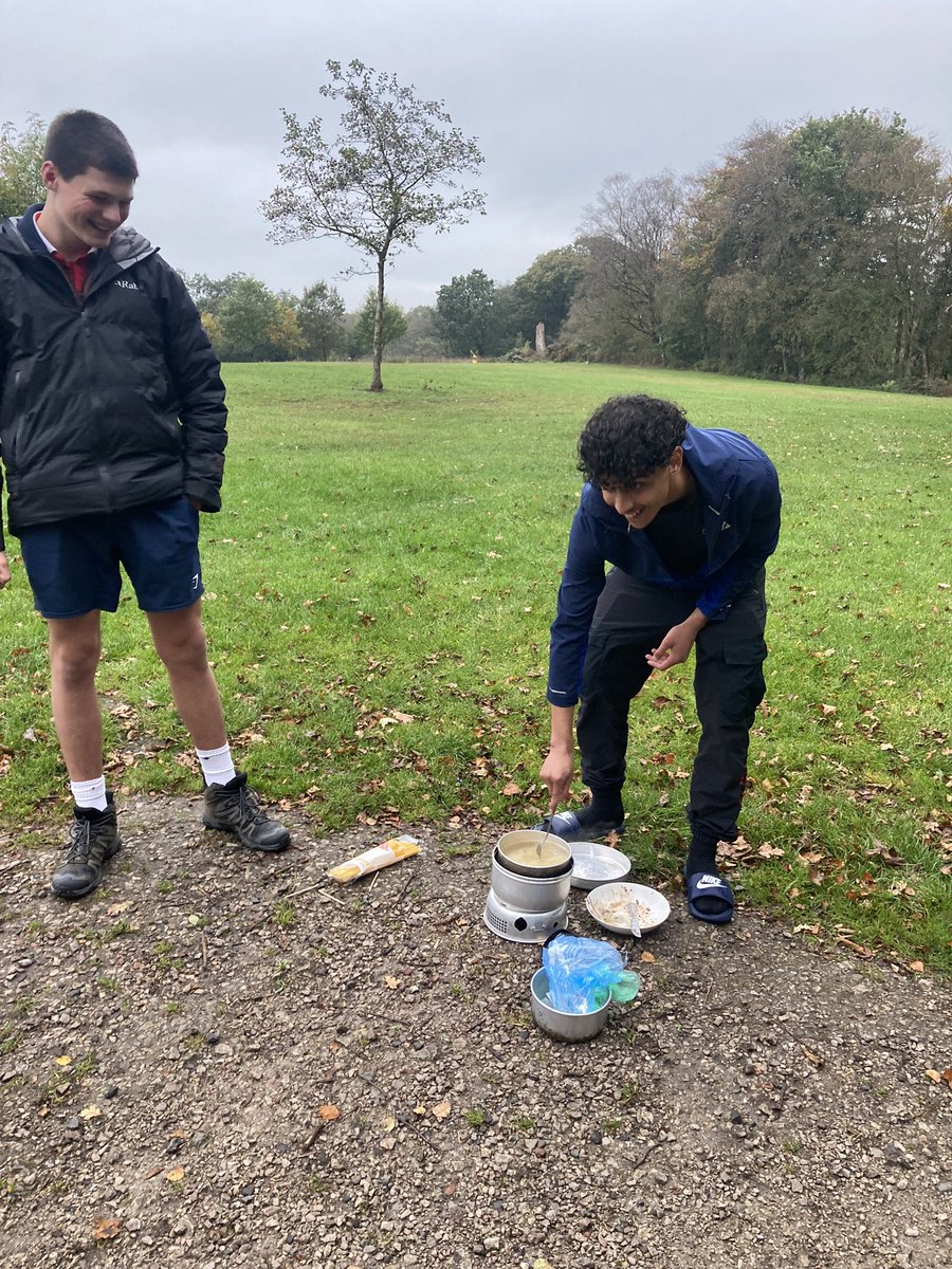 The best part of the day-cooking their camping cuisine!
