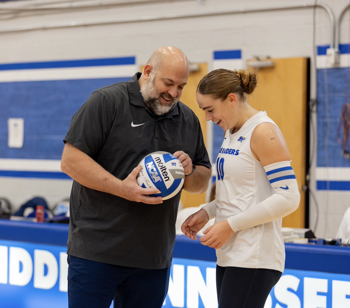 MT_Volleyball's tweet photo. Congratulations to Laure Jansen and Kiera Booth on receiving their milestone balls this weekend! 👏

- Laure reached 100 career service aces and 1,000 career digs.
- Kiera reached 1,000 career kills.

#BLUEnited | #BetterInTheBoro https://t.co/ggWO0CPmcT