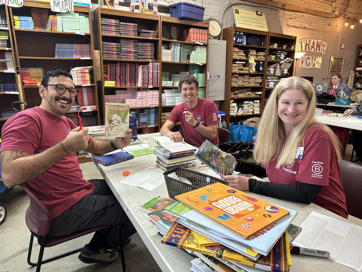 OverDriveInc's tweet photo. #TeamOverDrive had a great time volunteering at the #ClevelandKidsBookBank last week! 📚✨ It’s inspiring to see the impact of putting books into the hands of children in our community. We're proud to support an organization that turns our city into a book haven! 💖 #OverDrive https://t.co/sXbLjJ7ZXS