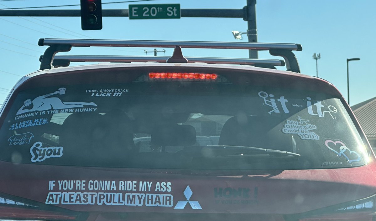 All those stickers and then a pride sticker in the corner lol this town is wild