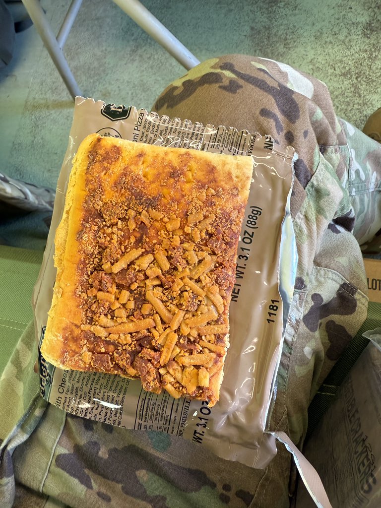 richardk1990's tweet photo. Hope y’all are having a better dinner than me 🥲. MRE pizza. https://t.co/aJXjIUwV7y