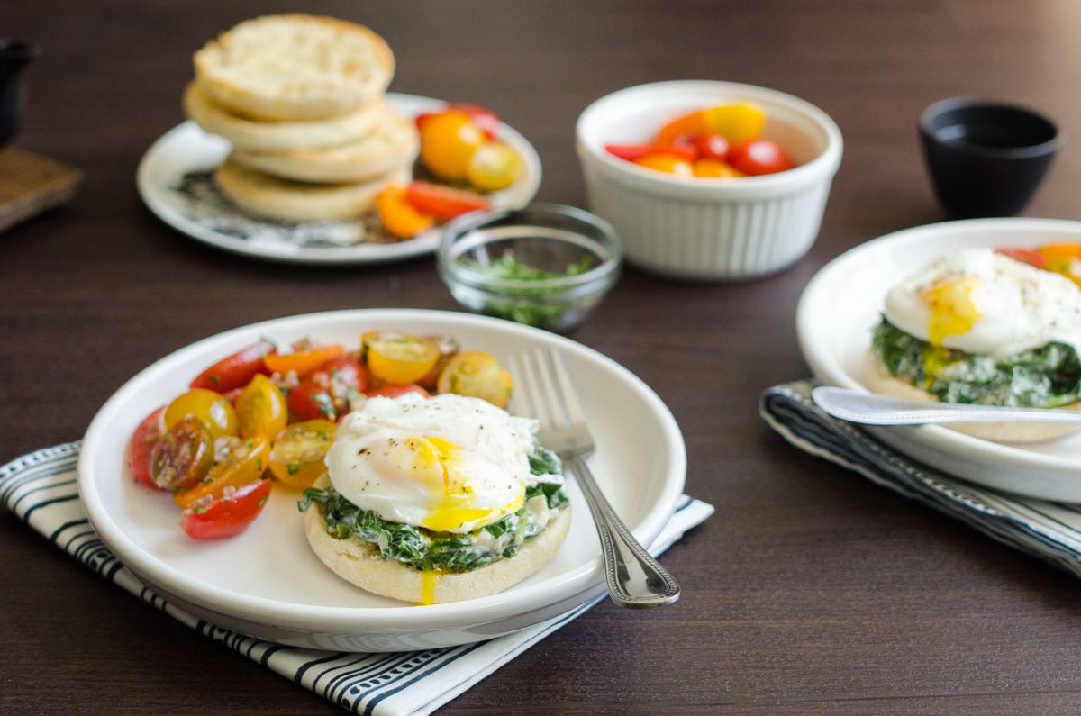 Poached Eggs with Creamy Spinach | This is a sophisticated but approachable variation on breakfast for dinner that was last featured in 2021. Read through the recipe before getting started so that you can be sure everything finishes at the same time. buff.ly/3BED7gV