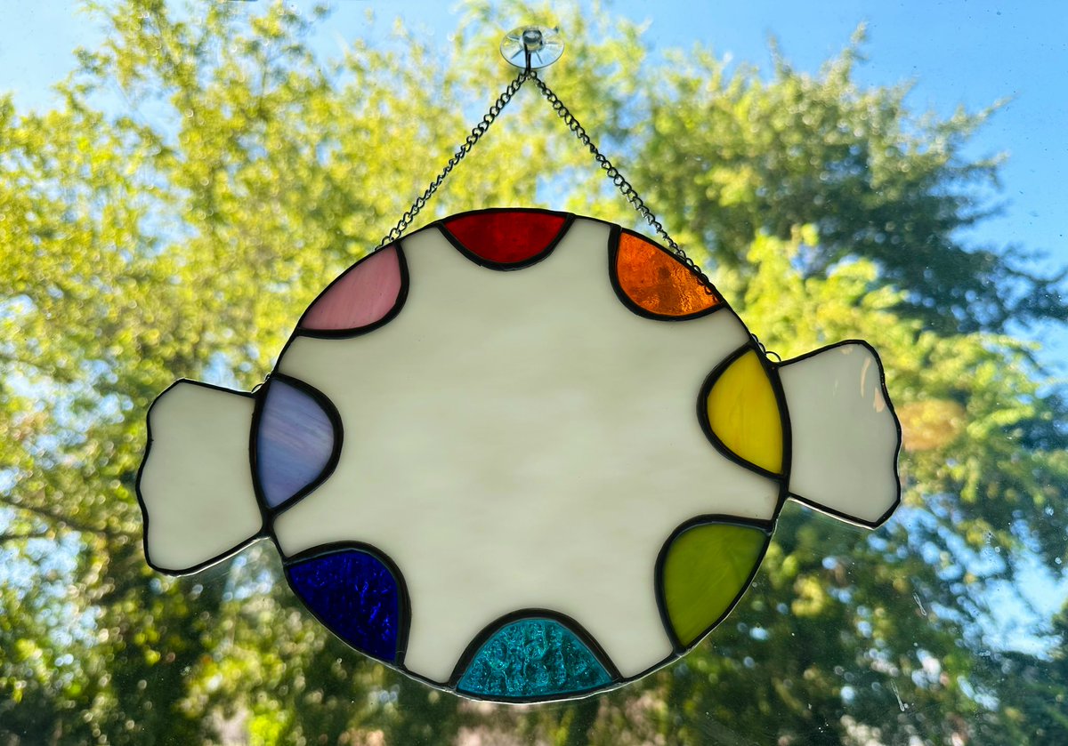 A community member hand-made my peppermint rainbow logo into stained glass 🥺✨ I LOVE it so much❣️