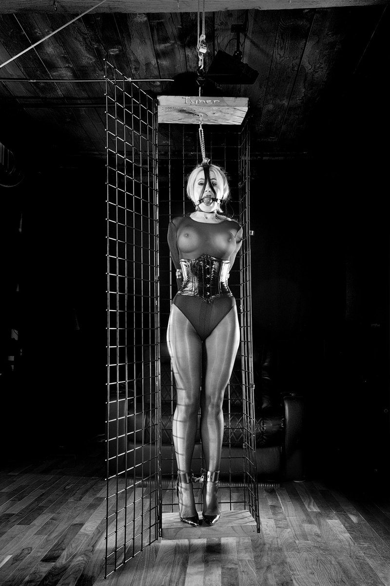 BaronTyher's tweet photo. My first time working with the amazing Randy Moore @moorefetish bound in leather restraints, gagged, corseted, and locked in Louboutin So Kate in my newly created cage for long term captivity/bondage. Shall we create Moore?