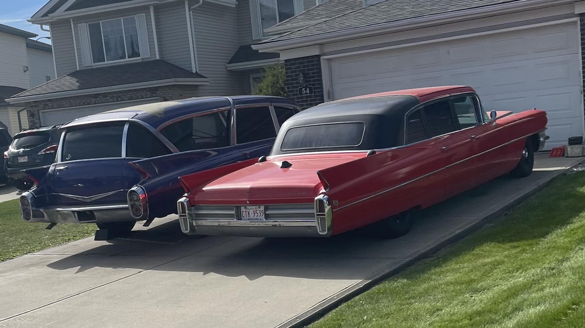 Our 60 Hearse and 63 Limo sitting together, this picture makes me happy:)...Driving Cadillacs in our dreams.