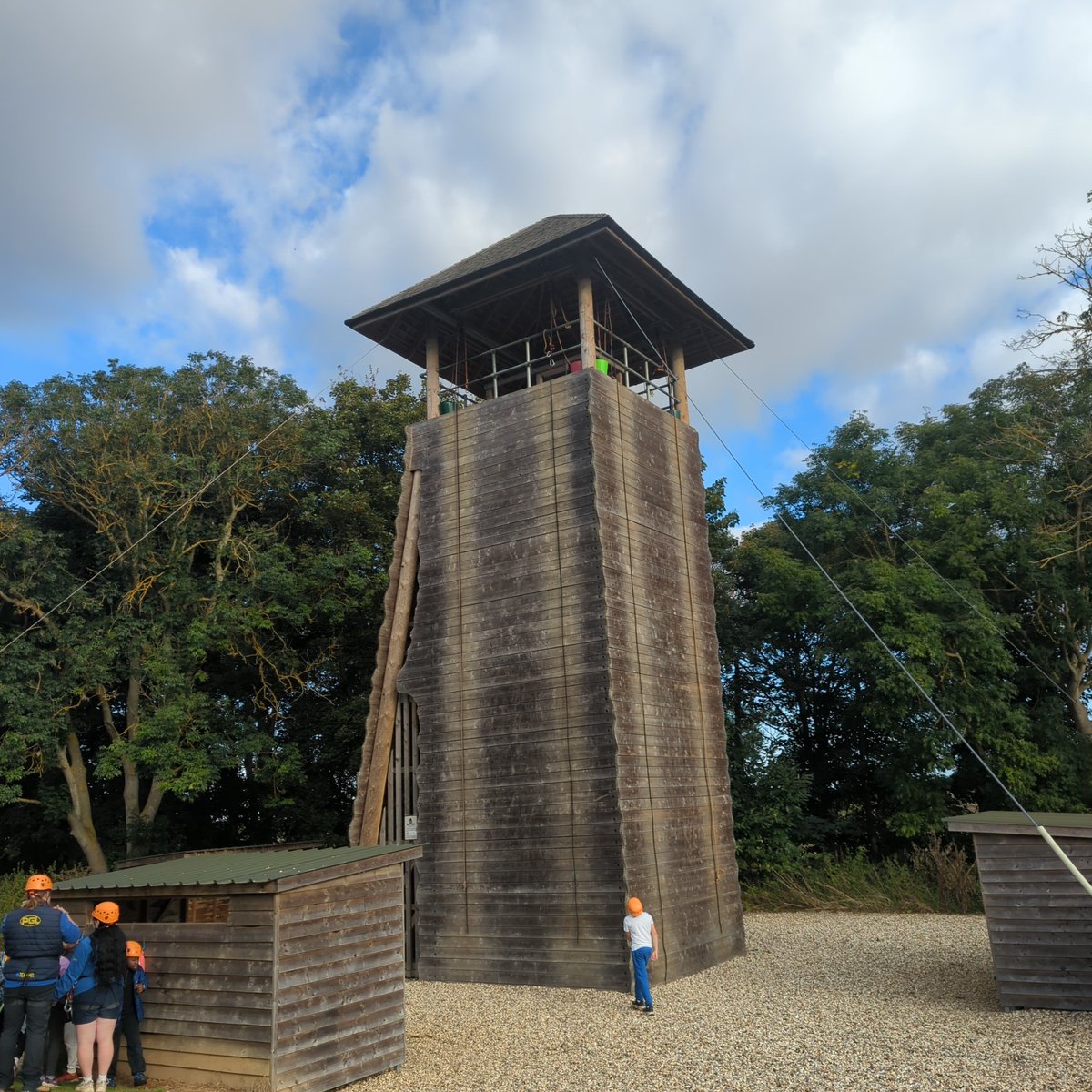 The sun is shining and Year 6 are on their way to their final few activities. Lots of sleepy faces, but smiling ones too. What better way to finish the week than abseiling down a huge tower?
