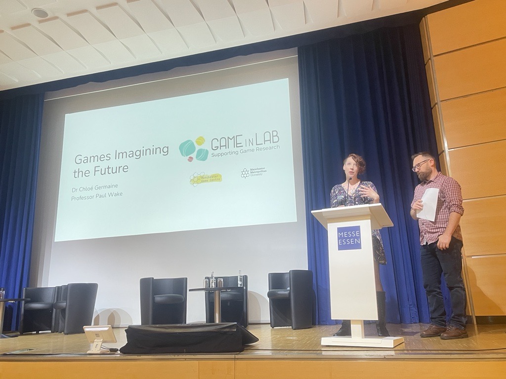 Here we are, live from the #SPIELtalks conference with @gothlit_chloe and @pfwgames! They're sharing insights on "Games Imagining the Future" and how board games can tackle climate change 🌍🎲 If you can't attend, stay tuned for the replay coming soon!  #SPIEL2024 #Sustainability