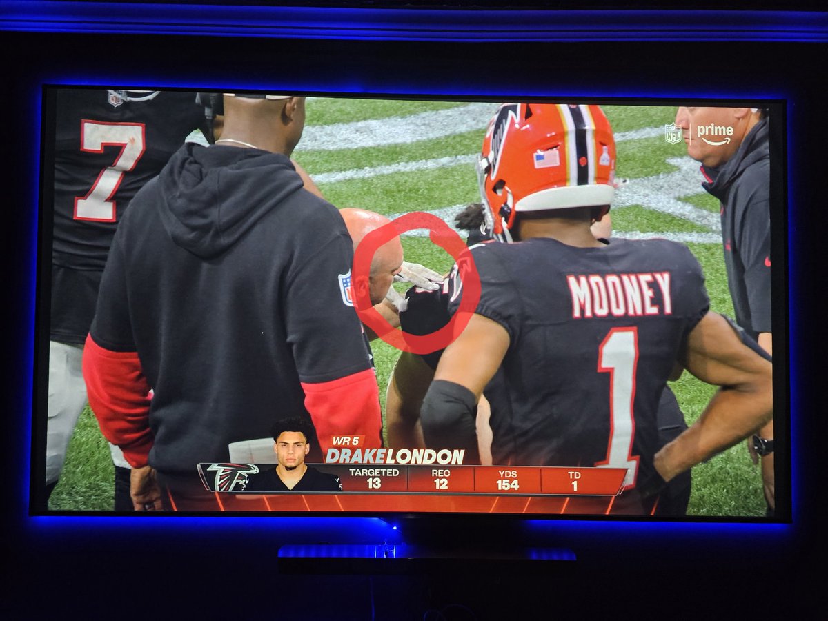 This will get missed by most. <a href="/Bijan5Robinson/">Bijan Robinson</a> laying hands on Drake London when he went down last night. This dude is different