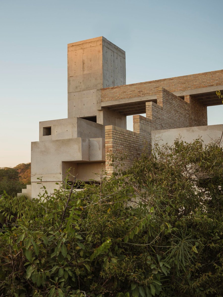 architonic's tweet image. This complex in #Mexico includes seven buildings consisting of fourteen interconnected villas, each with its own private pool. The #exteriors are made of clay, brick, wood and concrete, while the #interiors integrate clay and sand. architonic.com/20705848