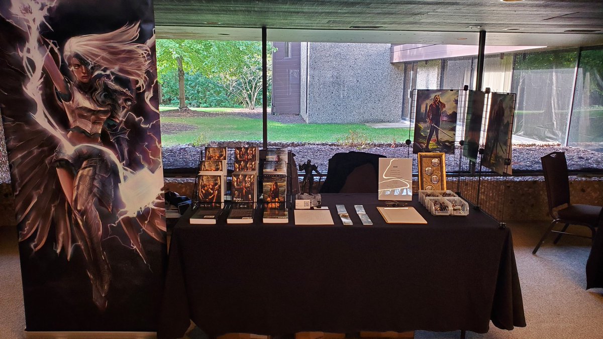 authorjaklore's tweet photo. All set up at Dragon-Fall in Lake Geneva! Stop by. Check out the books. And play some games. https://t.co/jSF8C5ij0u