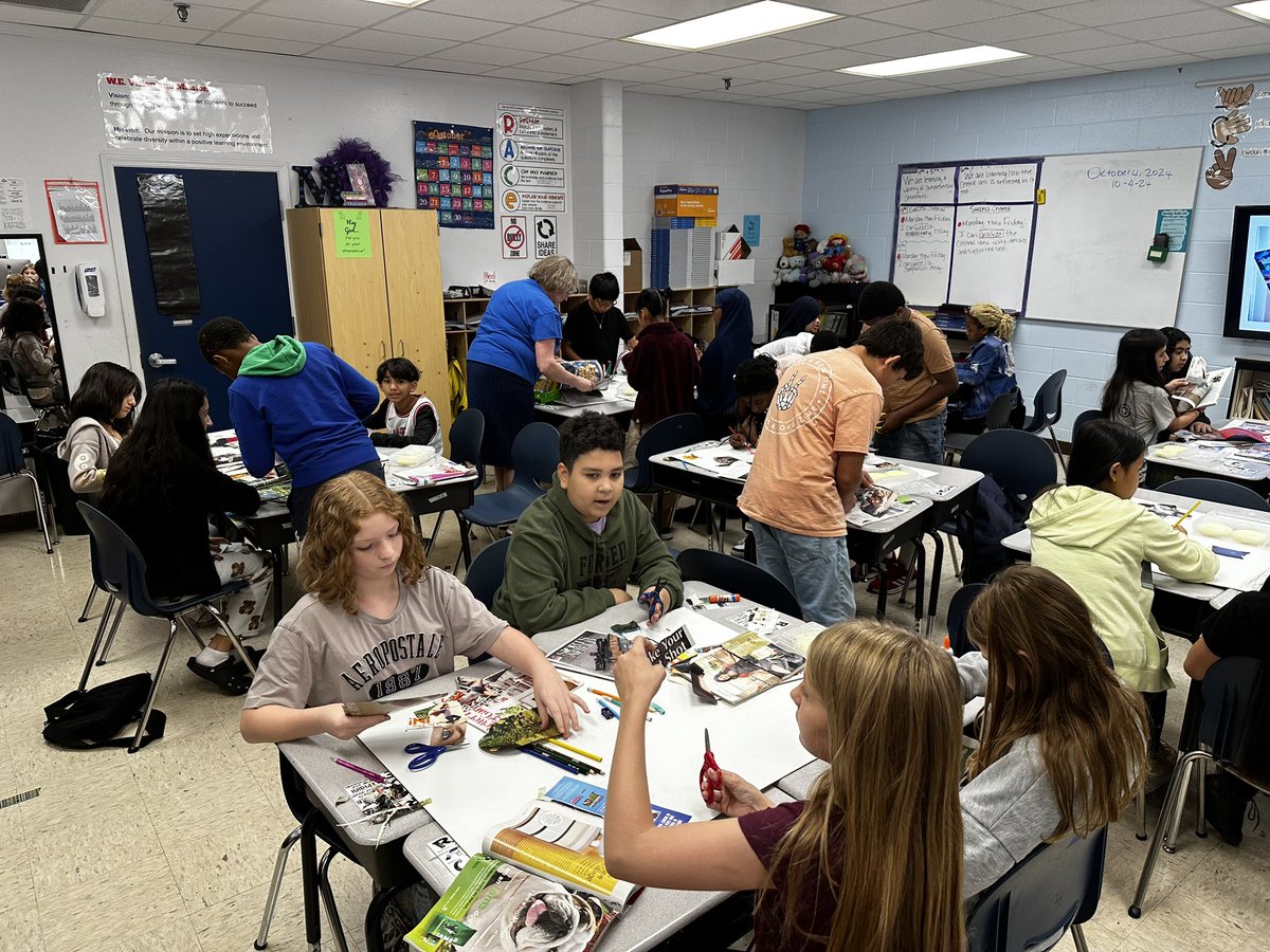 My 6th grade students making a Never Give Up Vision Board for their Introduction to their Unit 2