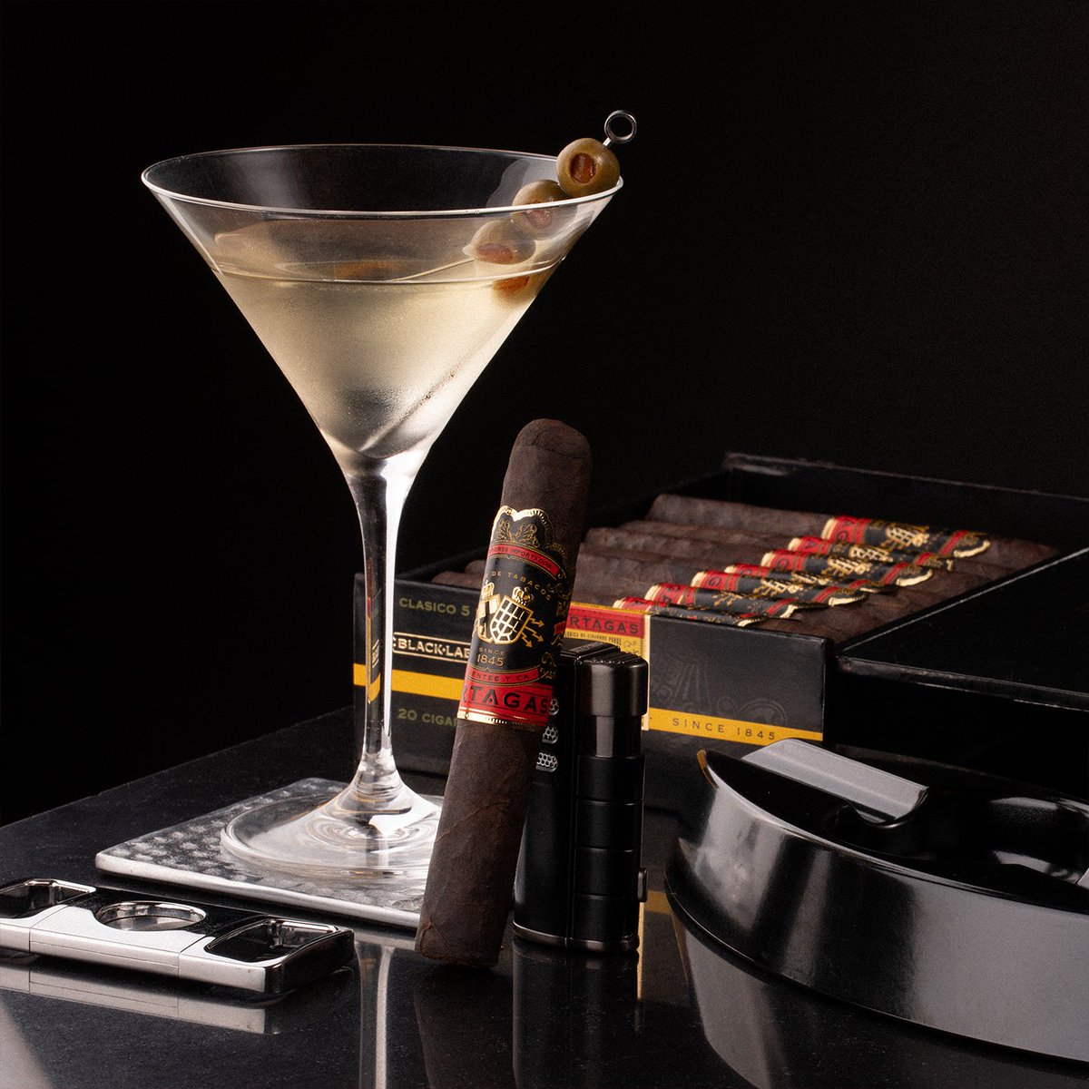 partagas's tweet photo. A true collaboration of strength and refinement. Indulge in Partagas Black Label and a vodka martini using the recipe on the second slide. #NationalVodkaDay
#PartagasCigars #PartagasBlackLabel #Martini #Vodka #MartiniGlass #CigarPairing https://t.co/RRSuuJ3ePL