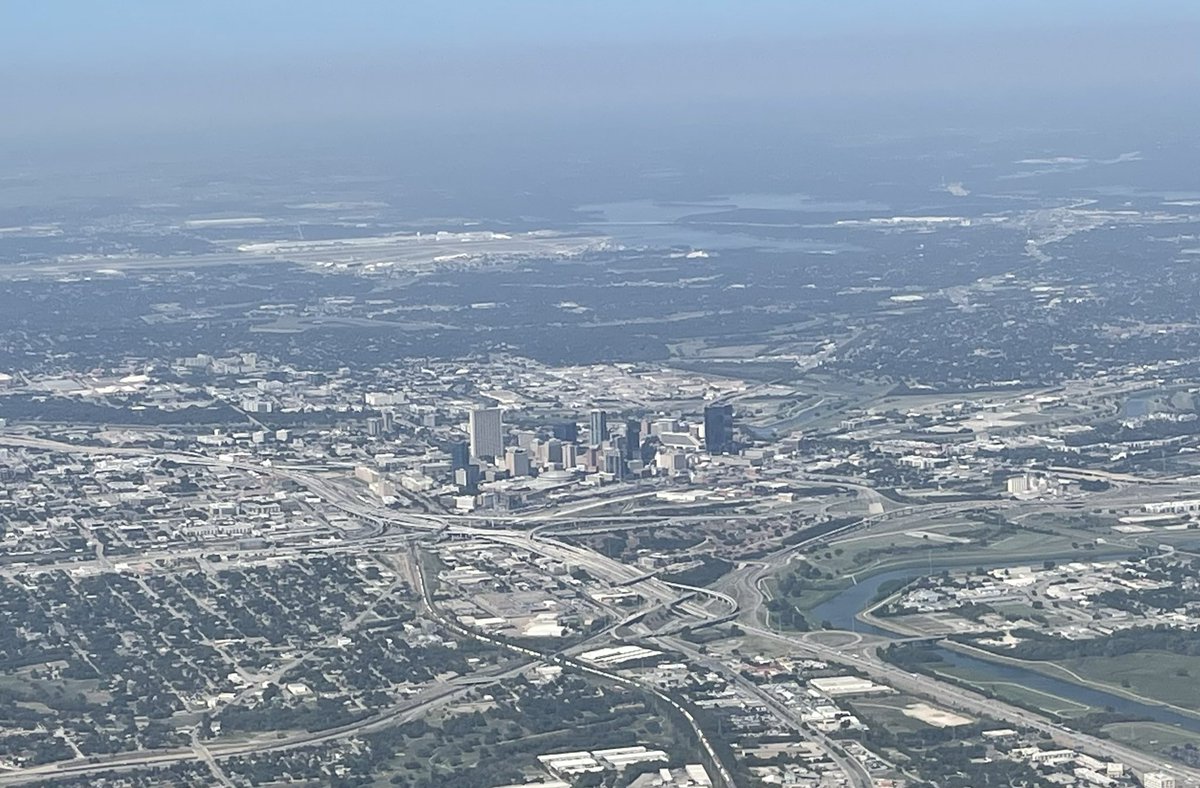 Downtown Fort Worth, Texas with NAS JRB Fort Worth and Lake Worth in the background