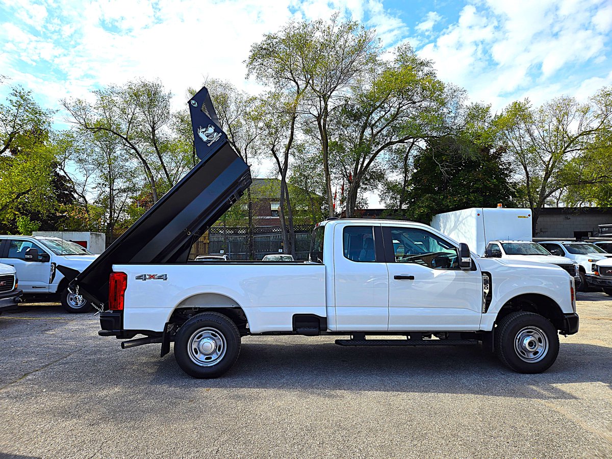 UnicellBodyCo's tweet photo. Buyers Products DumperDogg Stainless Steel Dump Insert transforms your pickup truck into a dump truck, making it easier to transport and unload heavy, loose material such as mulch or stone. Check out this truck we just finished at our Toronto facility! https://t.co/h5fz8TdAtU