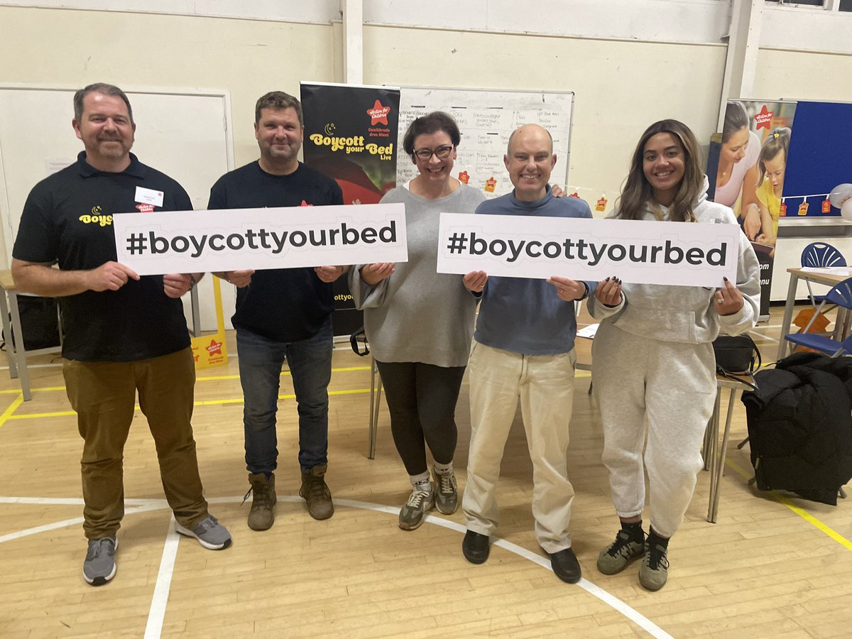 Team Wales <a href="/actnforchildren/">Action for Children</a> volunteers and the Wales <a href="/BoycottYourBed/">Boycott your Bed</a> board in place for #boycottyourbed 2024 at Headlands School <a href="/HeadlandsS/">Headlands School</a>