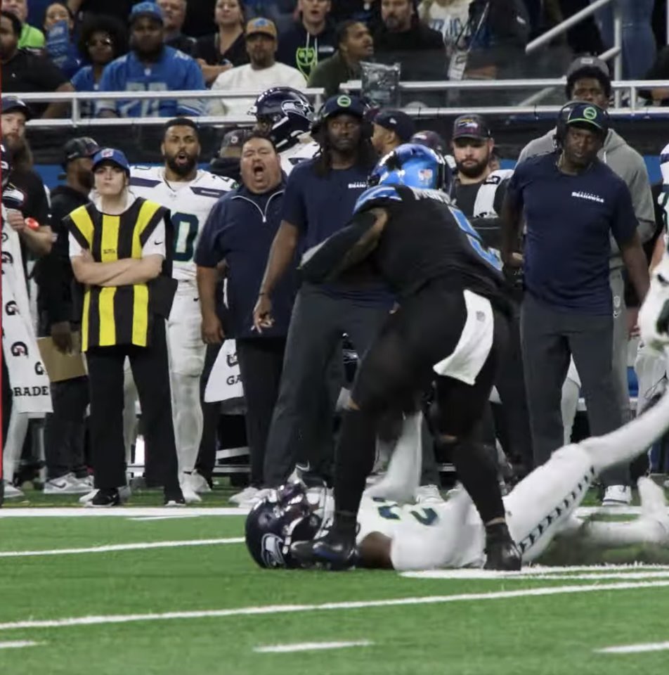 SpeakEZsports_'s tweet photo. A thread of reactions on the Seattle Seahawks sideline to David Montgomery’s truck stick on Devon Witherspoon. https://t.co/V7O0fMZoff