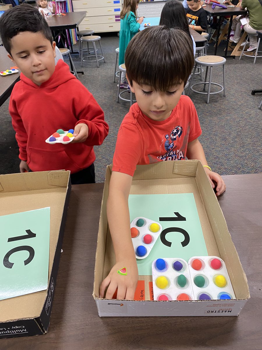First grade artists had SO much fun mixing secondary colors with their primary colored clay!