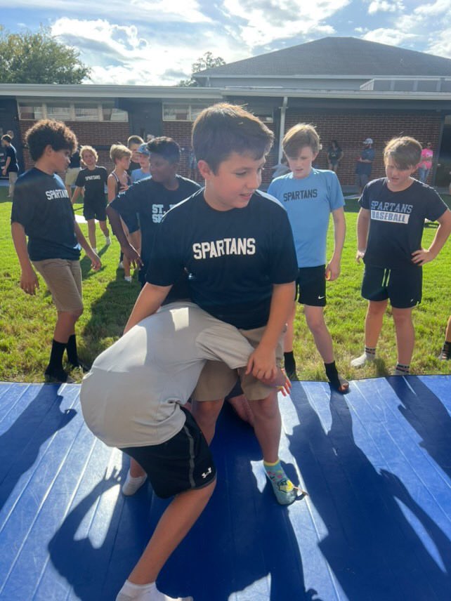 Spartan Fest 2024. After the faculty beat the students in the basketball game 44-41, we did a takedown challenge in the quad for students. #spartanup <a href="/sjcdsathletics/">St. Johns Country Day School Athletics</a> @stjohnscountrydayschool