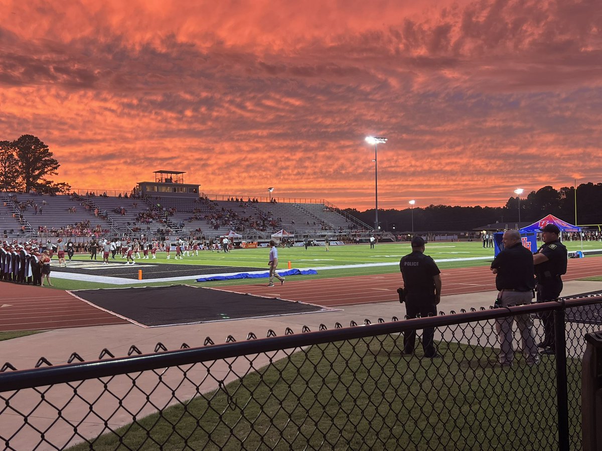 hendrixtony's tweet photo. A @spann type of sunset for the @1rebelfootball https://t.co/yObUitExIj
