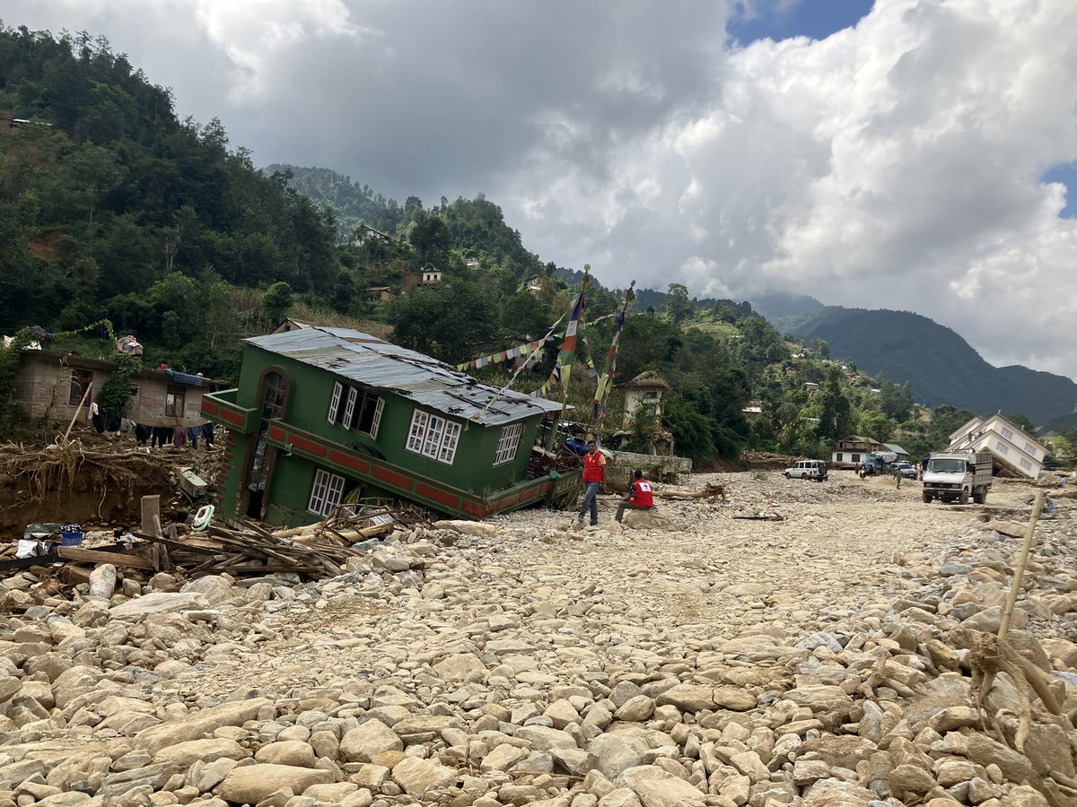 CaBrSimonsen's tweet photo. Devastating and extensive damages caused by floods in Kavre, Nepal. 

📸 Binod considers himself lucky as his house is still standing. Neighbors’ houses on both sides are not. 

@NepalRedCross is responding with with assessments ongoing. 

#alwaysthere #RedCross #extremeweather https://t.co/sbbYqeUPd2