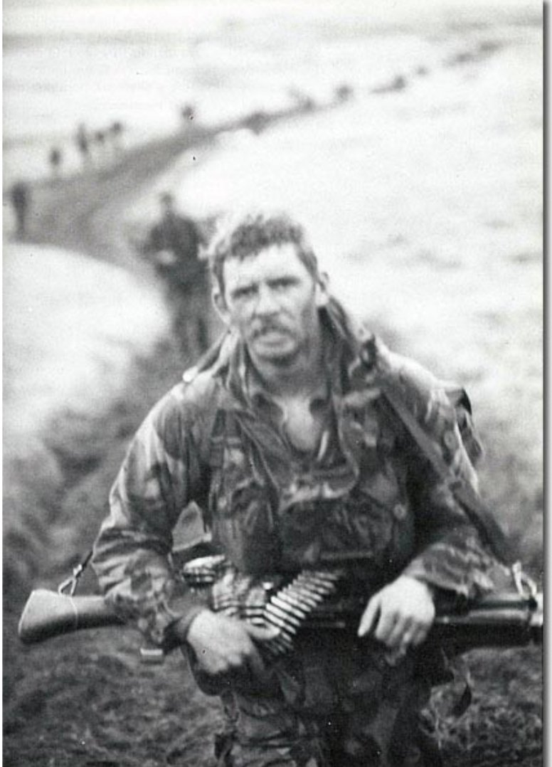 A member of 45 commando yomping across the Falkland Islands. With the destruction of the Atlantic Conveyor, much of the helicopter airlift capacity of the British had been lost. 

British forces had to literally walk across the width of East Falkland Island.