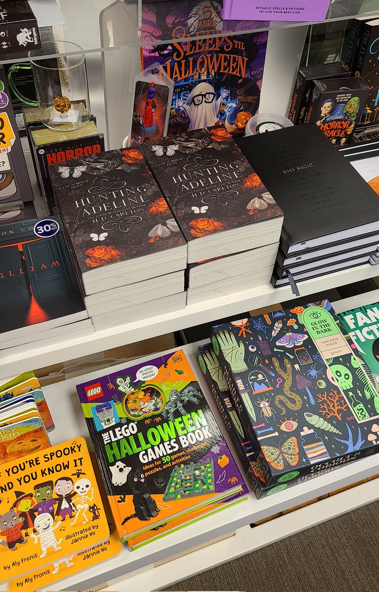 Something unsettling about Hunting Adeline being placed next to children's Halloween stuff 😂 iykyk