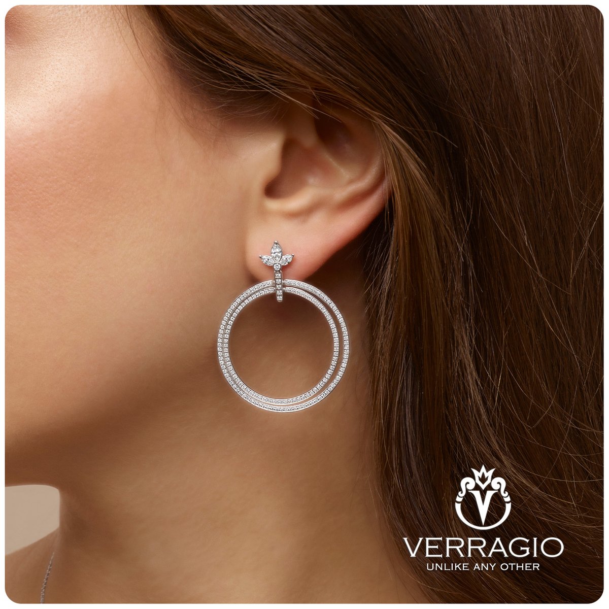 Where elegance meets brilliance, ✨ These 18k white gold Crest Double Circle Drop Earrings, adorned with round and marquise-cut diamonds, make a striking statement of style. 💎

 ℹ️: J-0177710-WE

#Verragio #Jewelry #Earrings #DiamondJewelry #DiamondEarrings