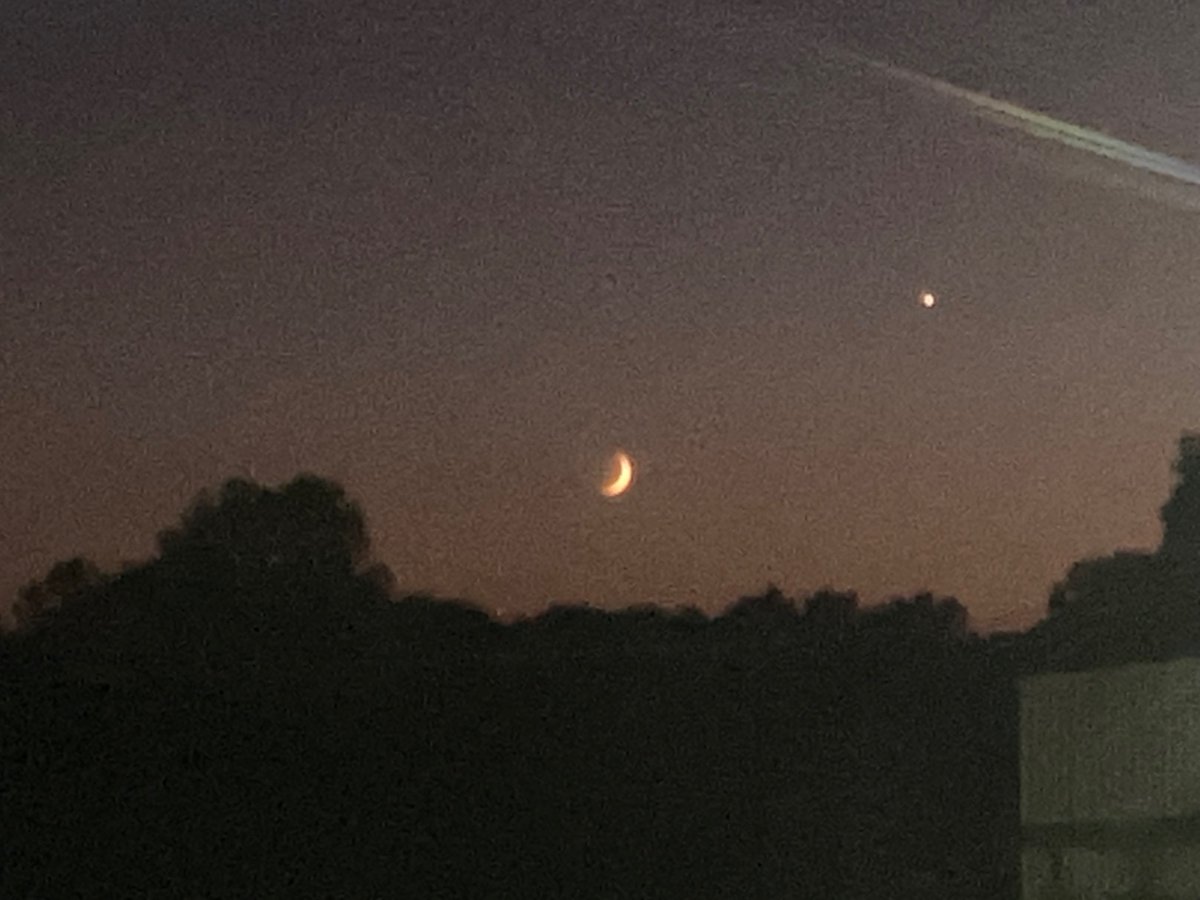Not a great picture but the moon setting into the sunset this evening was interesting 🤠
