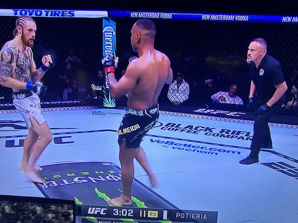 when you lie on your job application and end up reffing a cage fight live in ESPN:

#UFC307