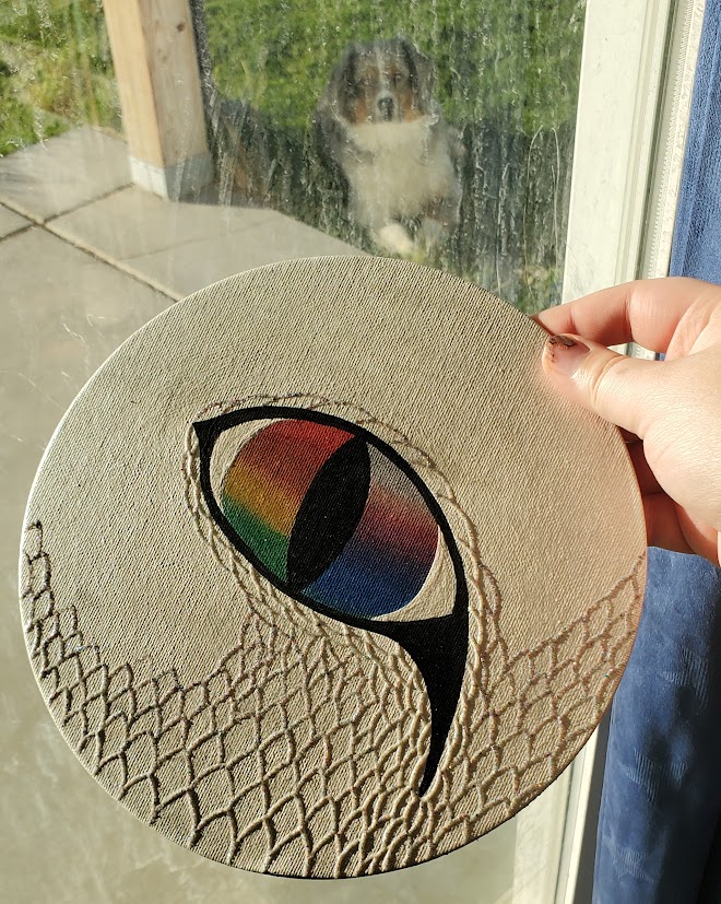 I'm painting dragon eyes, cause I like dragon eyes. Also, have my dog doing a photobomb