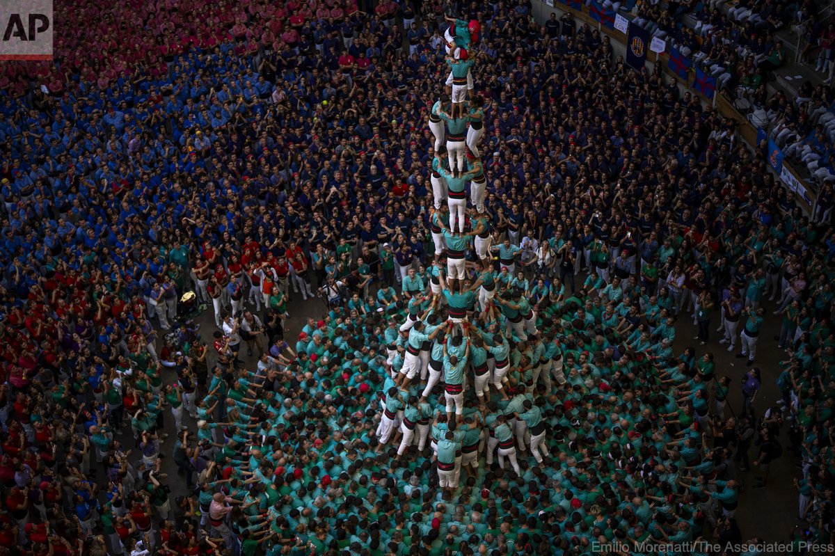 Member of “Castellers de Vilafranca” form a "Castell" or human tower, during the 29th Human Tower Competition in Tarragona, Spain, Sunday, Oct. 6, 2024. <a href="/concurscastells/">Concurs de Castells</a>