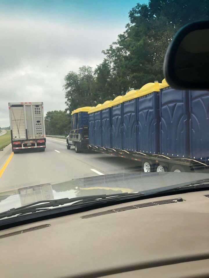 Michigan football team bus leaving Seattle heading back to AA