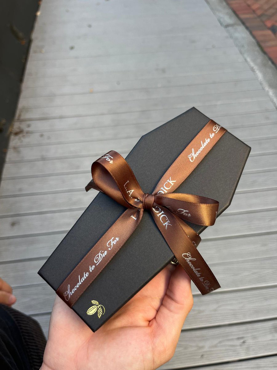hostiachan's tweet photo. a coffin chocolate assortment for a goth baddie (me) https://t.co/M02IZAeQ8B